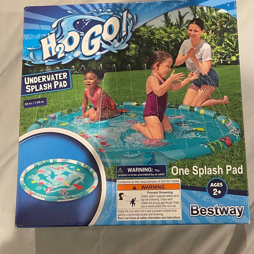 Kids splash pad. New in box.